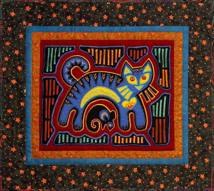 Machine Appliqued Mola with a cat and mouse.